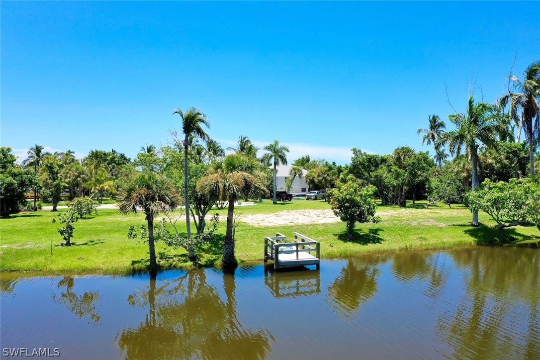 a view of a lake with a big yard