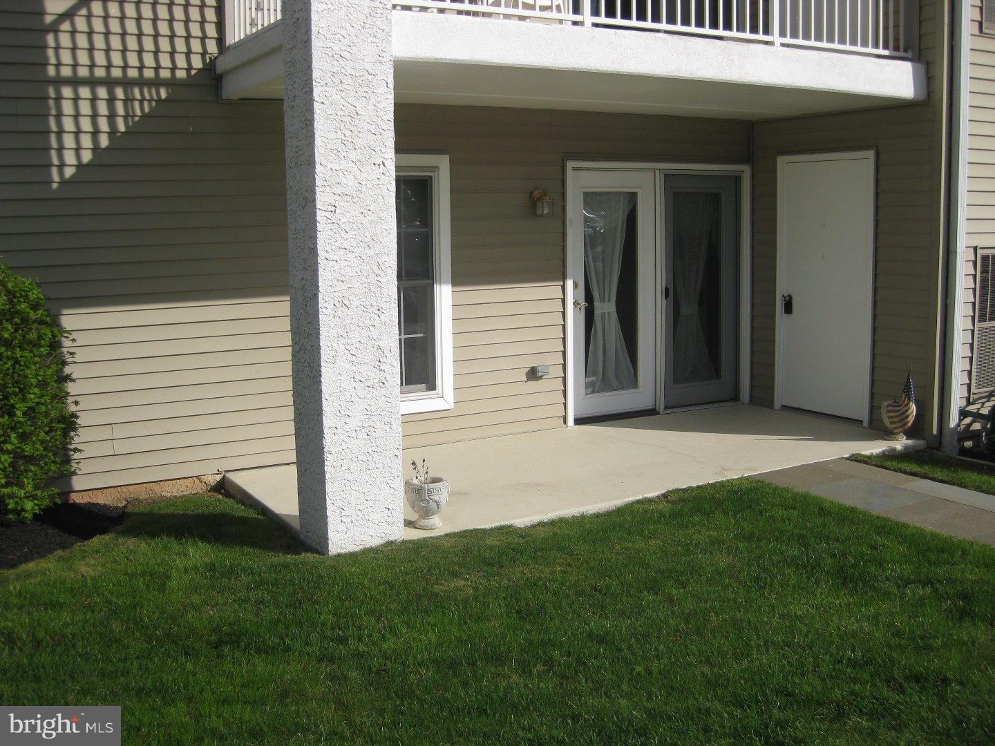 a view of a back yard of the house