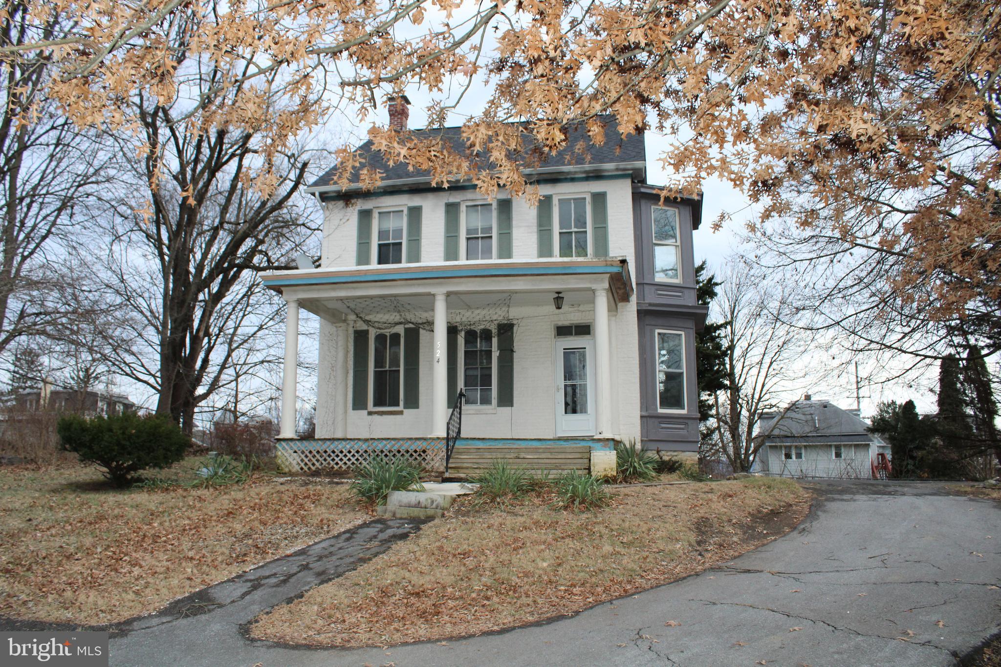 front view of house with a yard