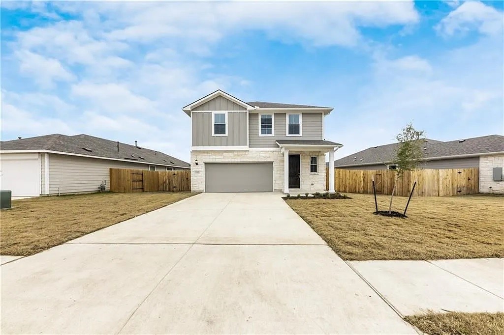 a front view of house with yard