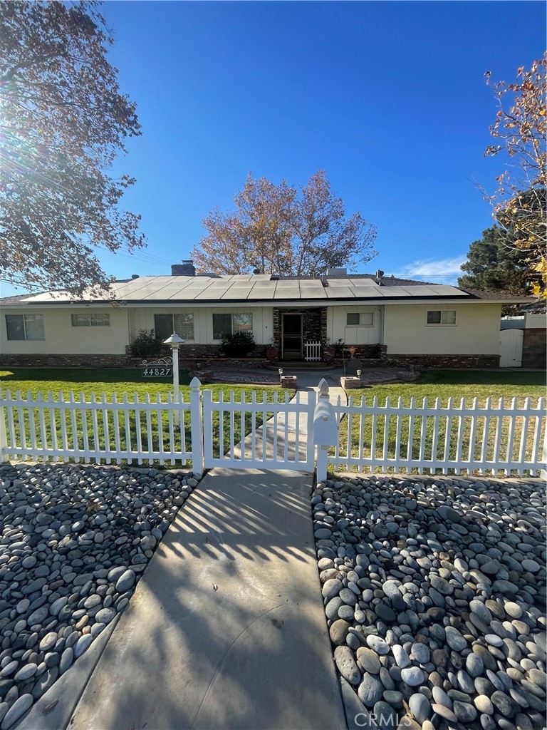 a front view of a house with a garage