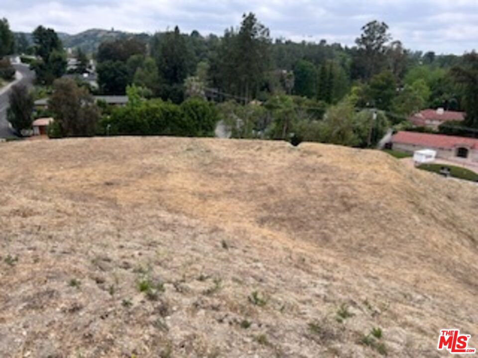 a view of an outdoor space with mountain view