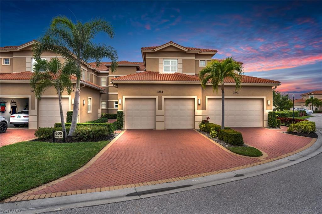 Mediterranean / spanish home with a garage