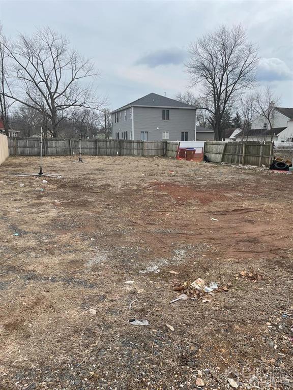 a view of a yard with a house