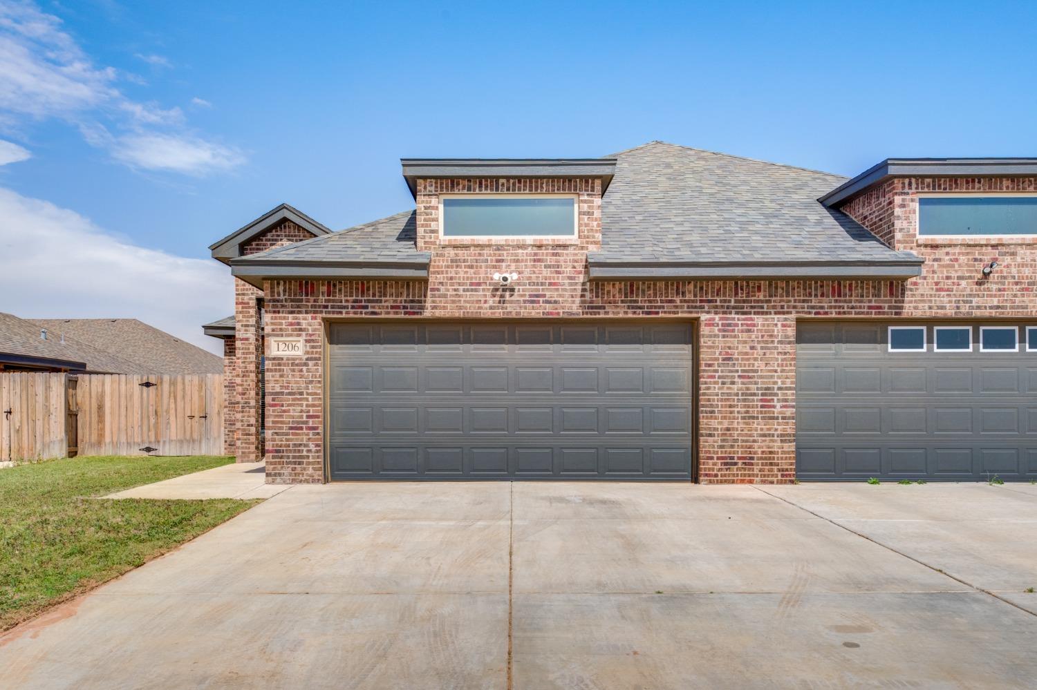 front view of a house with a garage