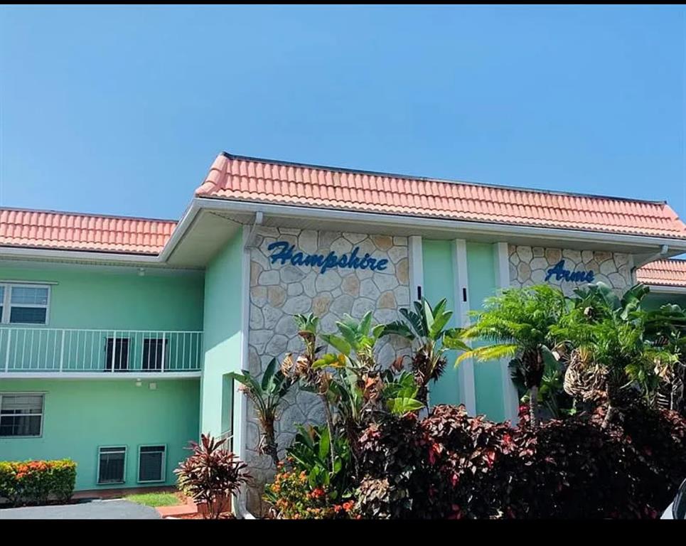 a front view of a house with a garage