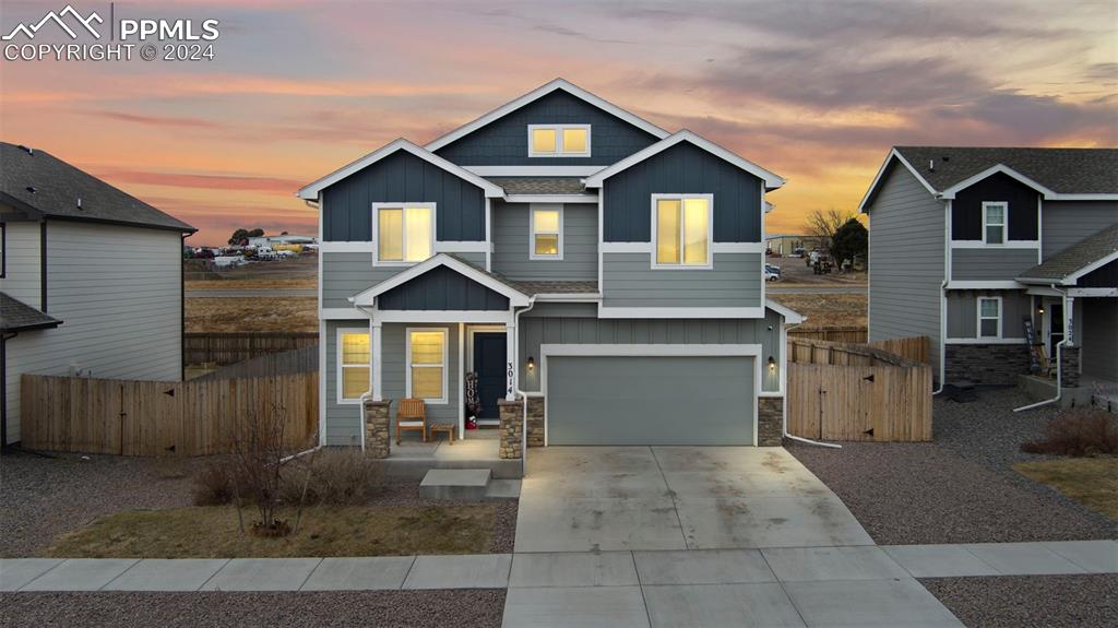 View of front of home with a garage