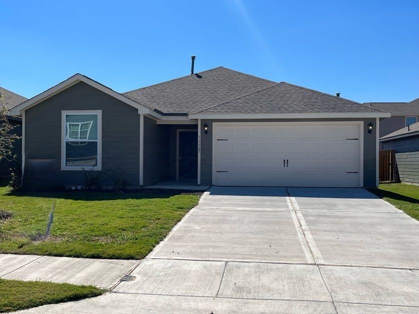 a front view of house with yard