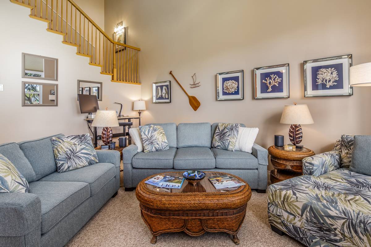 a living room with furniture and a couch