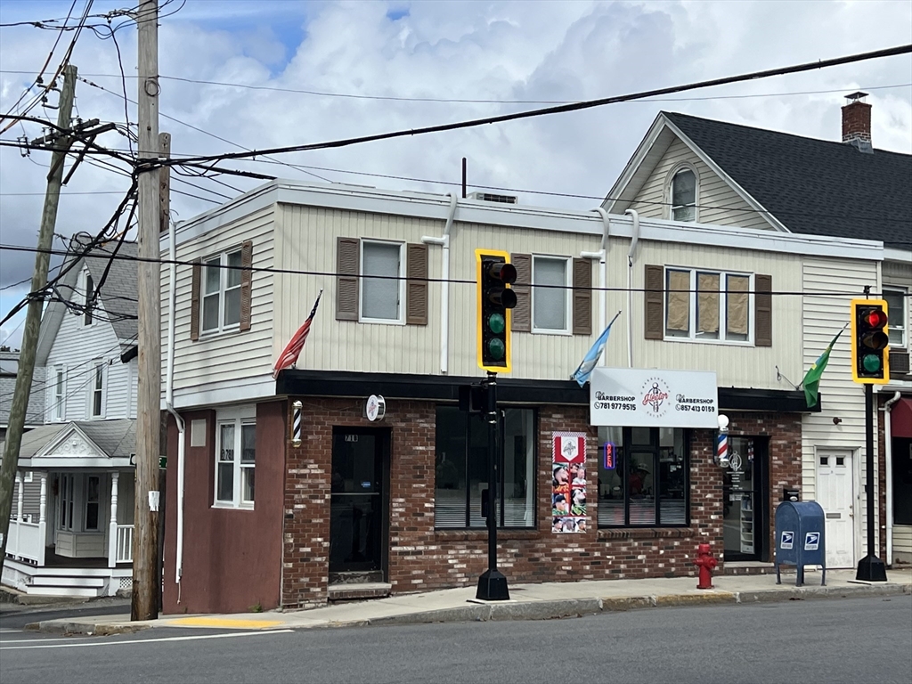 a front view of a building and a street