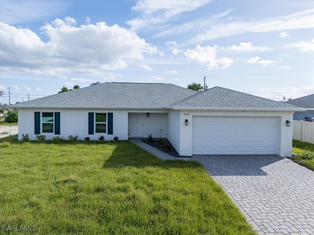 a view of a yard in front of a house