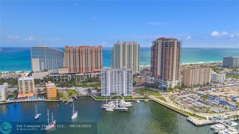 a view of water with tall buildings