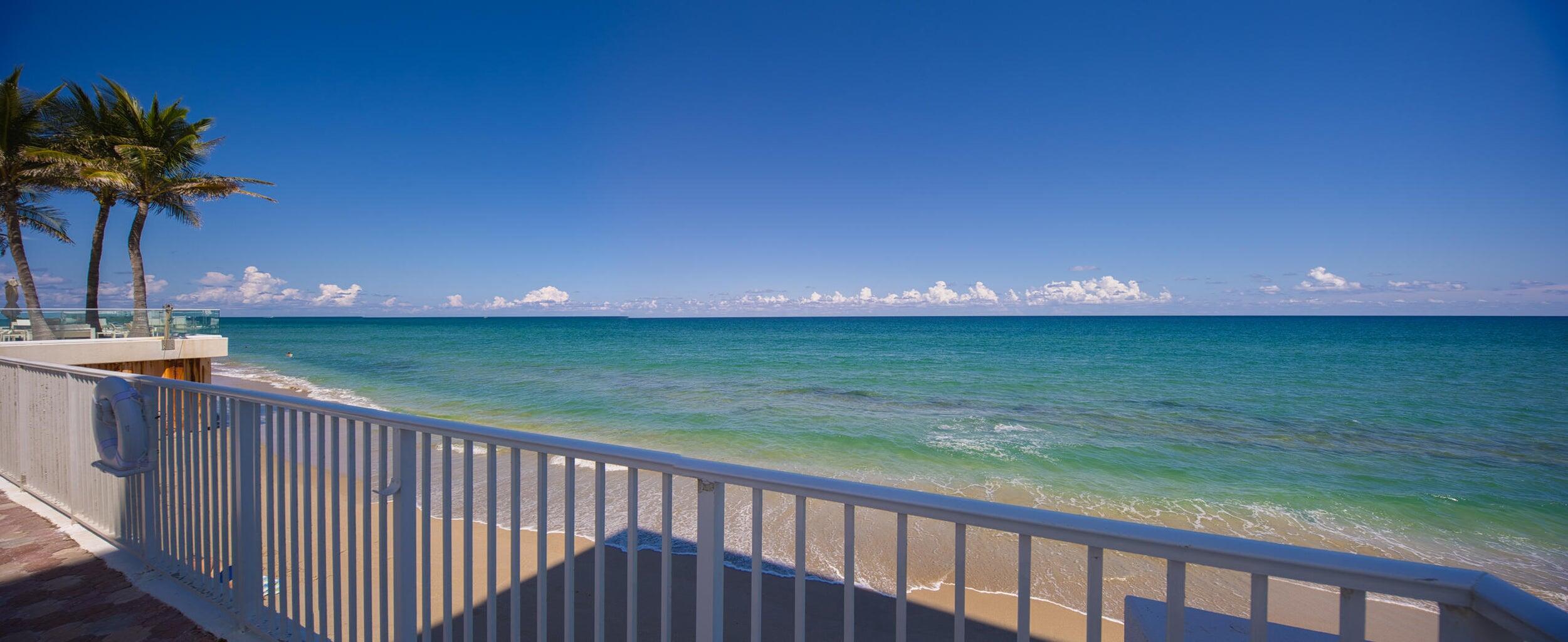 a balcony with an ocean view