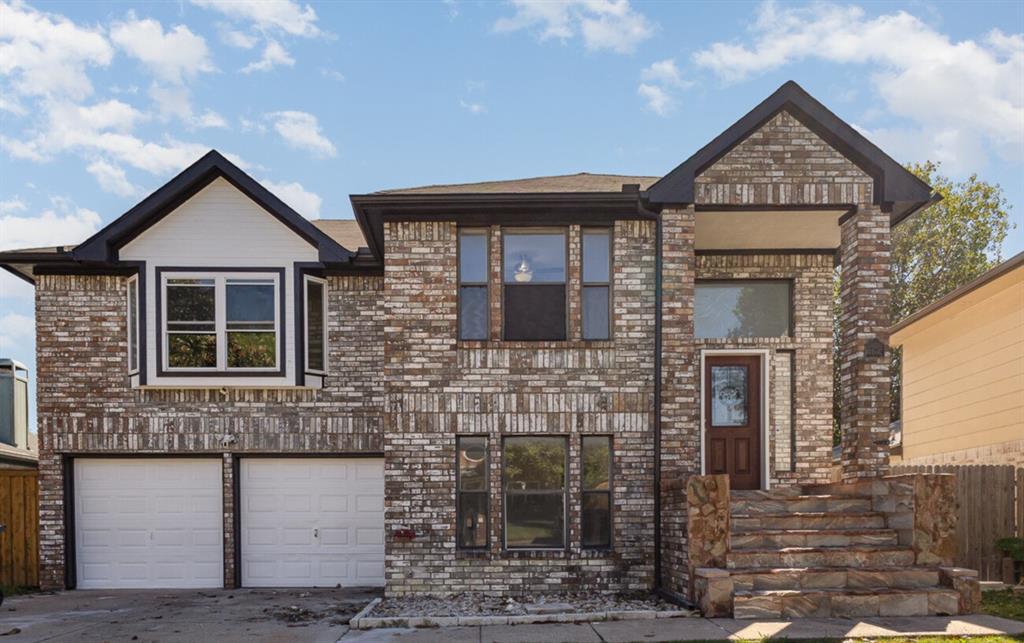 a front view of a house with glass windows