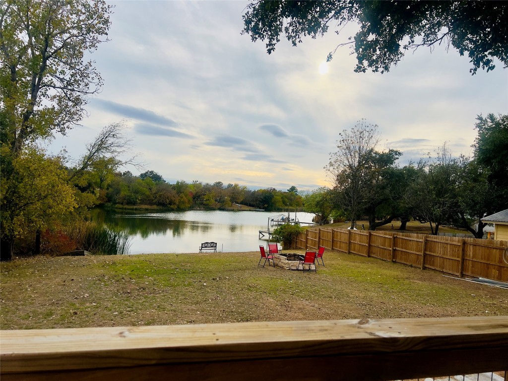 a view of a lake with a big yard