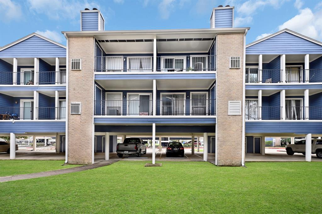 a view of an apartment with many windows