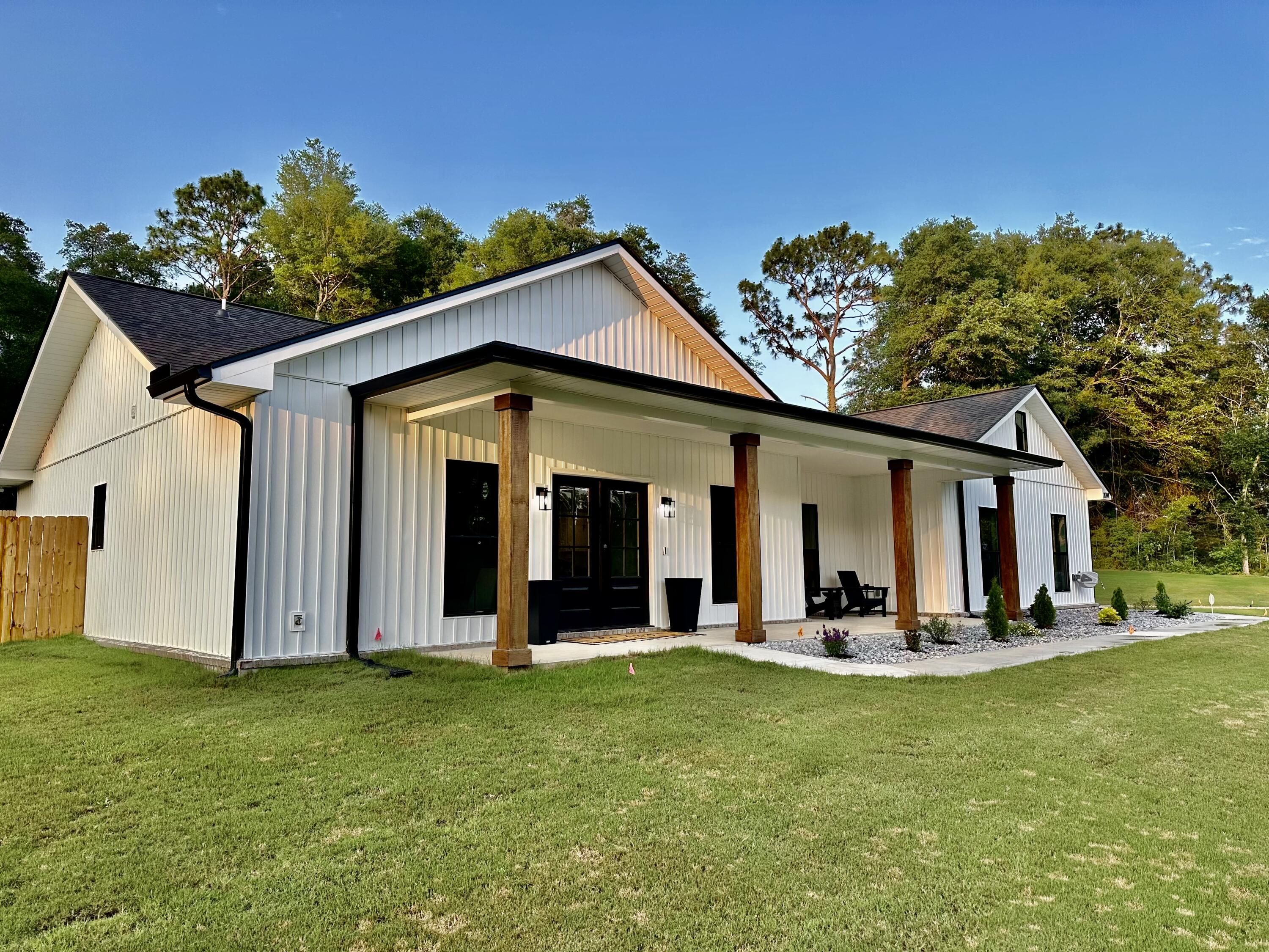 front view of a house with a yard