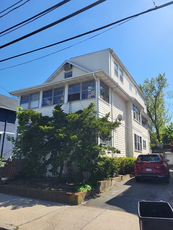 a front view of a house with garage