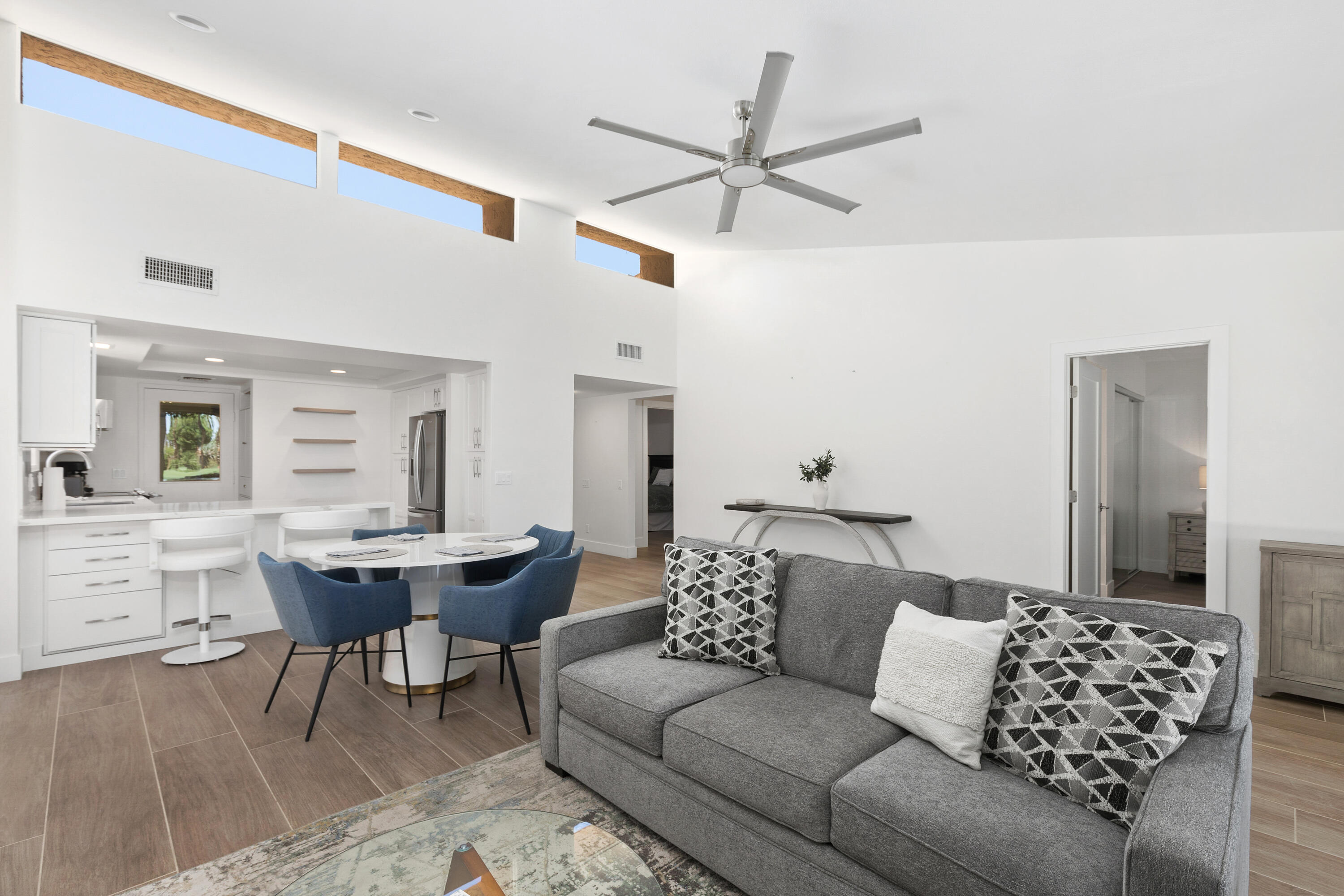 a living room with furniture and a table