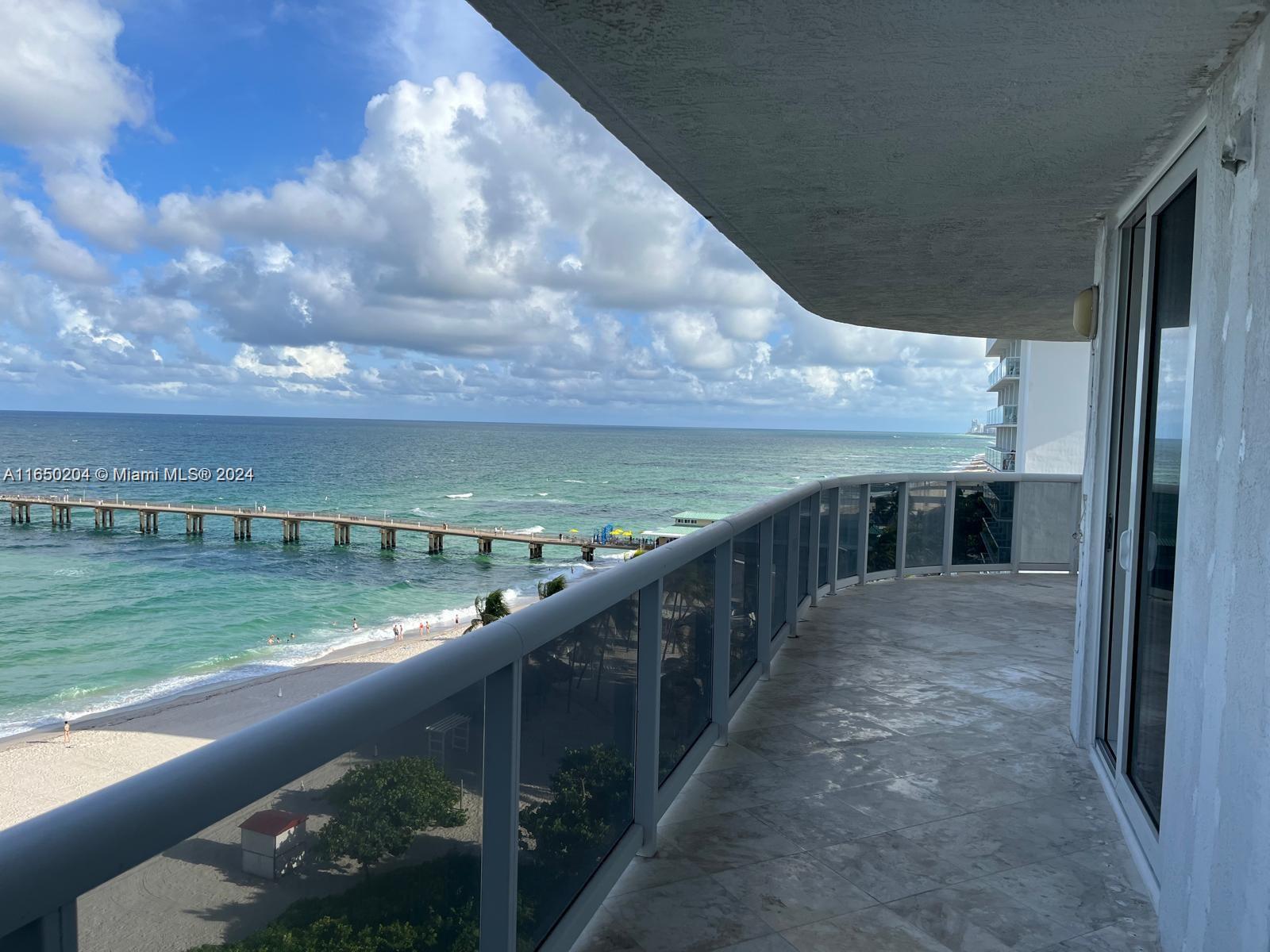 a view of a balcony with an outdoor space