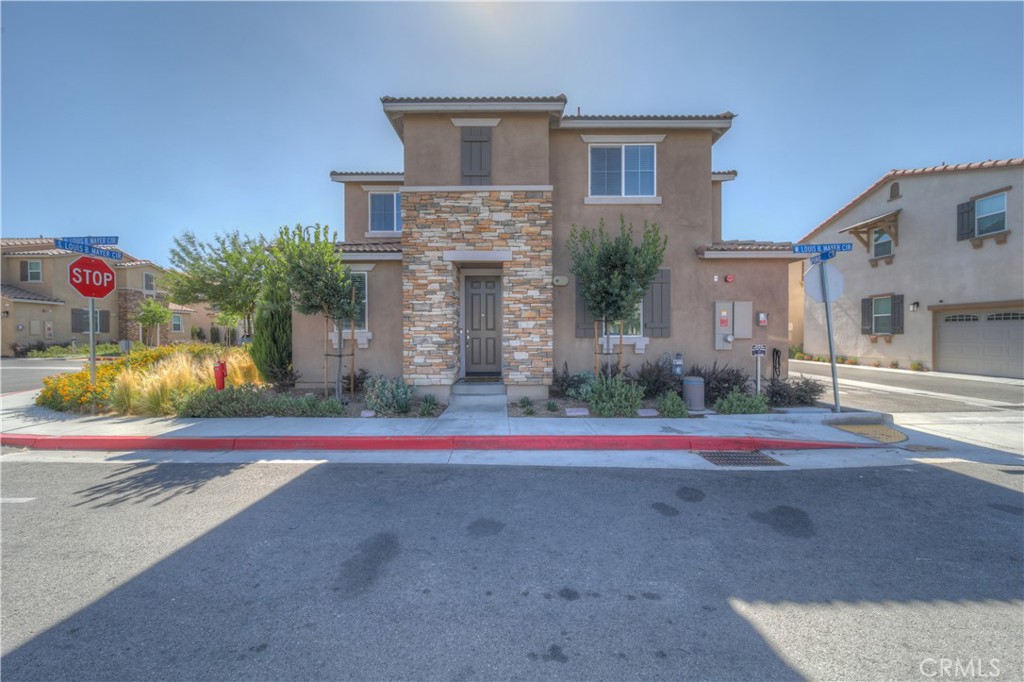 a front view of house with outdoor space