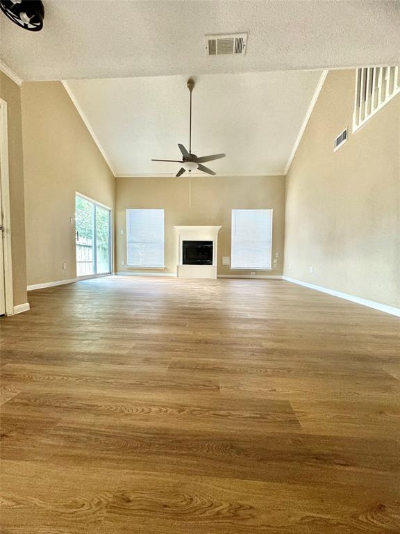 a view of kitchen and empty room