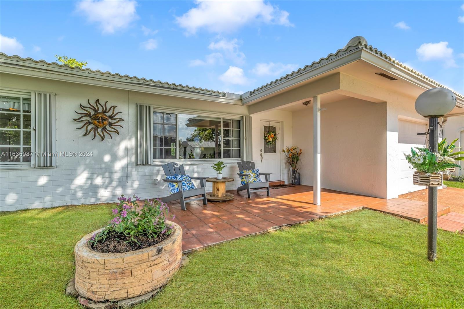 Look at this welcoming home! Front Patio