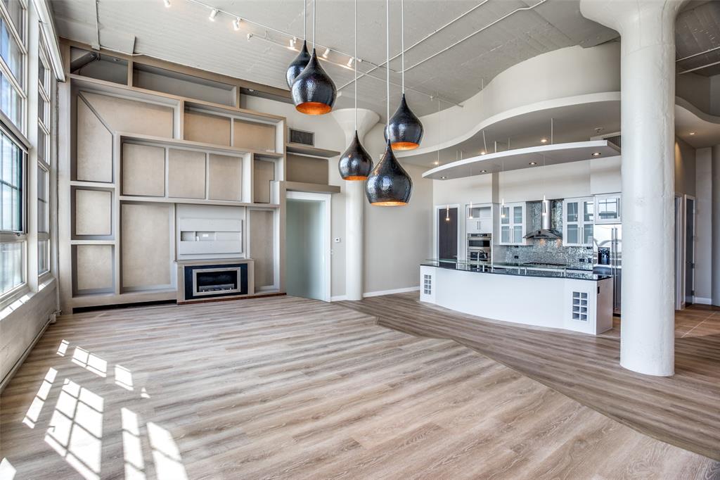 a view of a kitchen with furniture and a kitchen