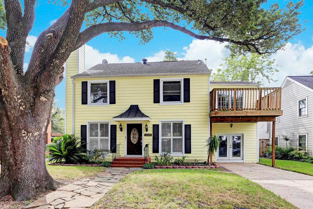 Beautiful home on tree lined street.