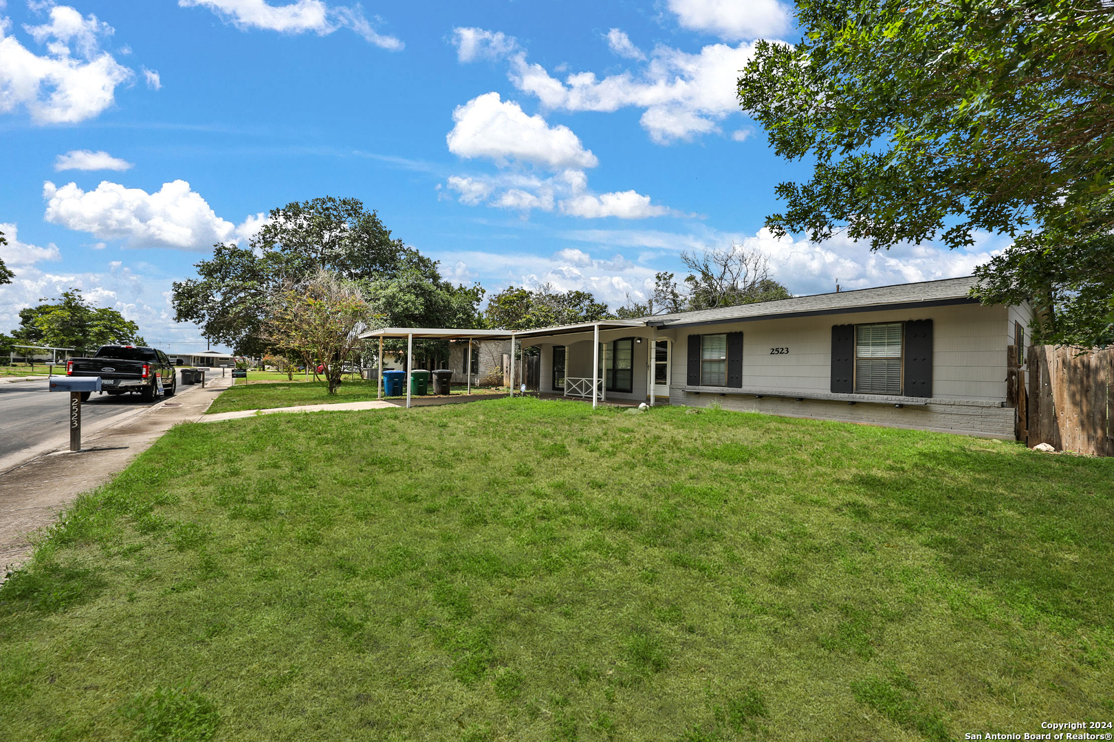 a view of house with outdoor space