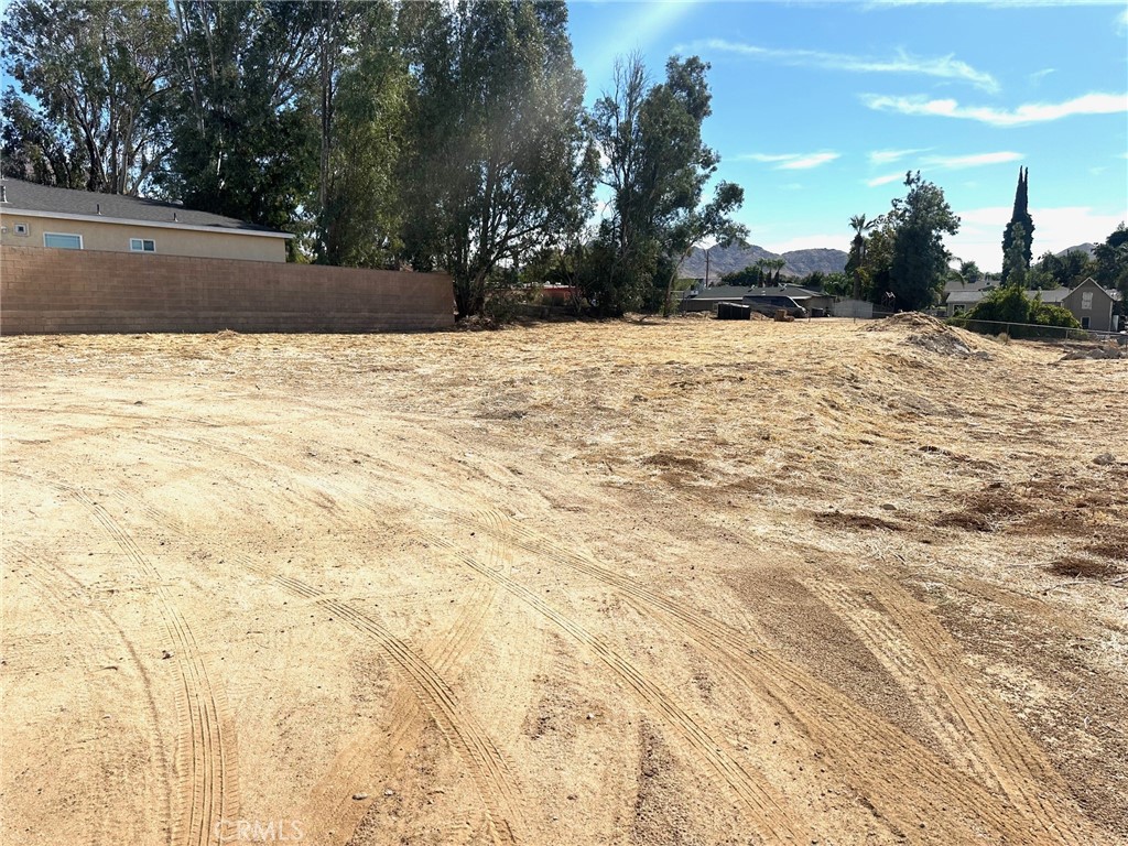 a view of swimming pool with a yard