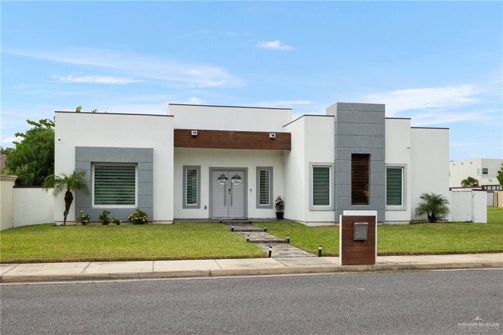 Modern home with a front lawn