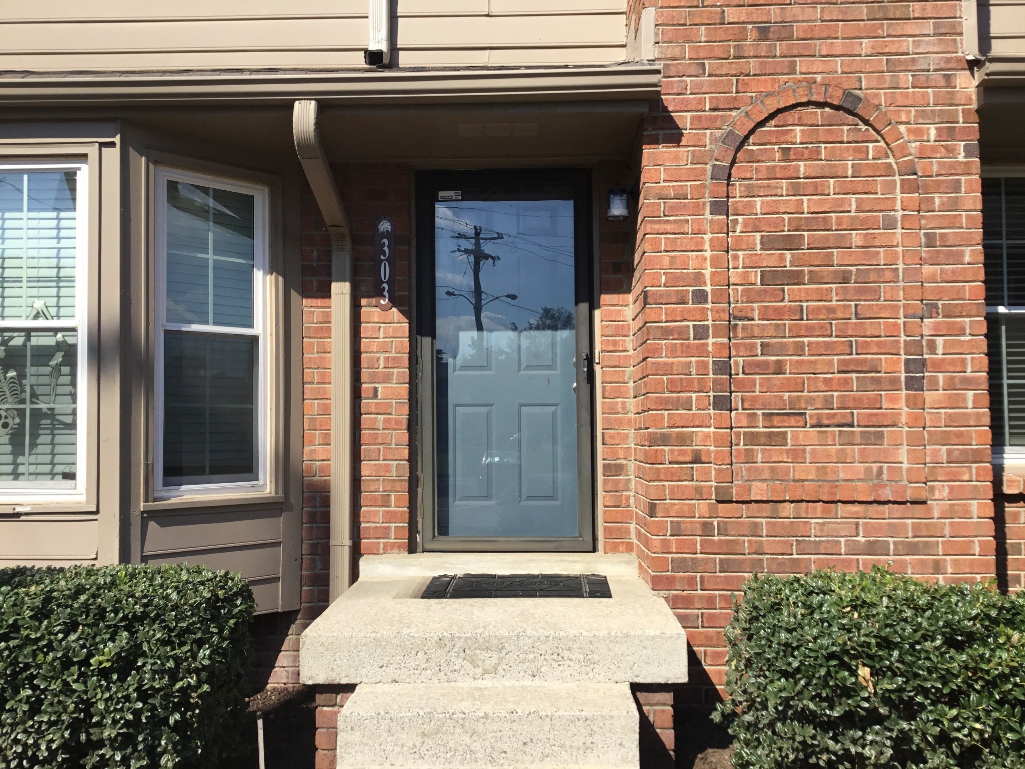 a front view of a house with a shower