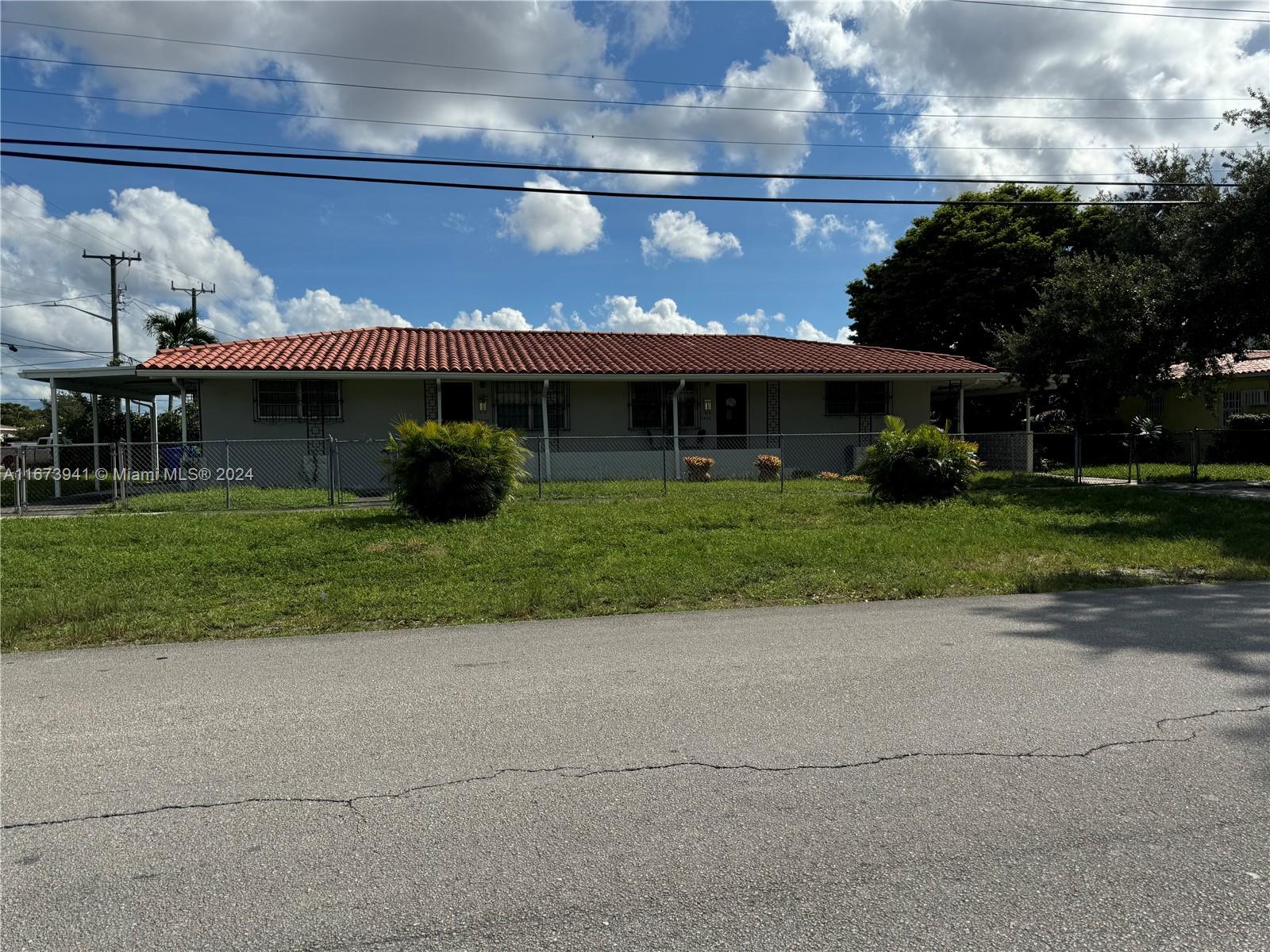 a front view of house with yard