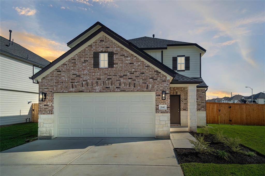 Welcome home to 2647 Village Side Trail located in the community of Fairpark Village and zoned to Lamar Consolidated ISD.