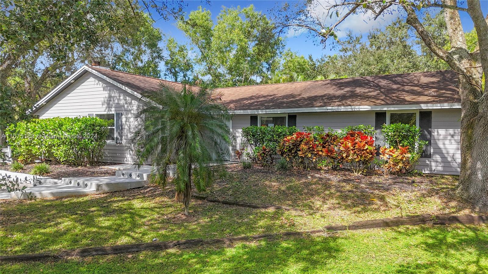 a front view of house with yard