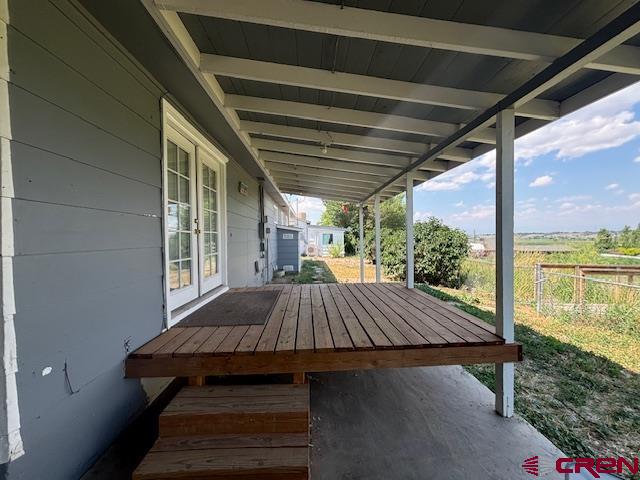 a view of backyard with sitting area