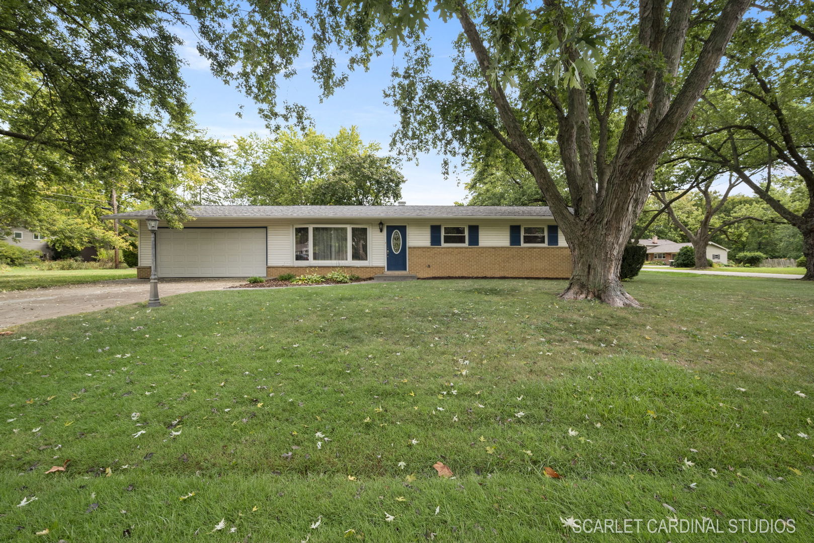 front view of a house with a yard