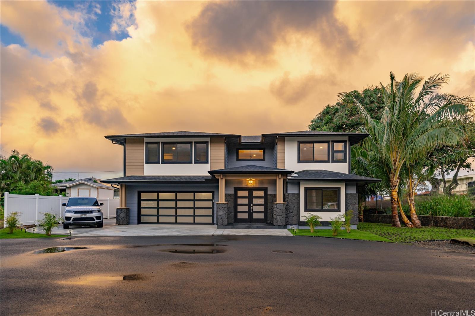 front view of a house with a yard