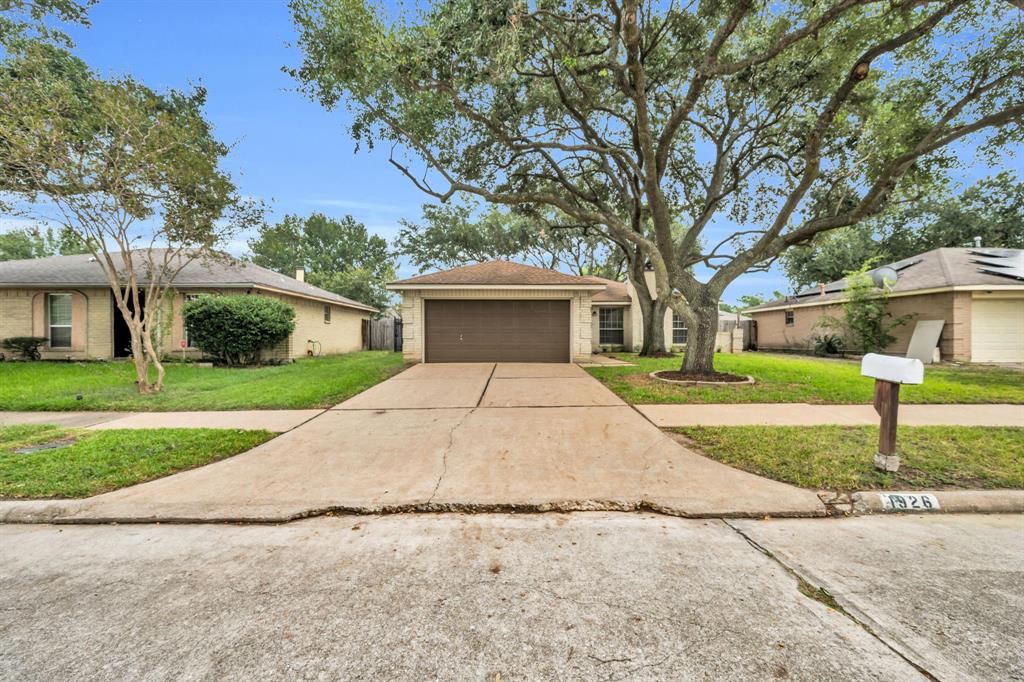 front view of a house and a yard