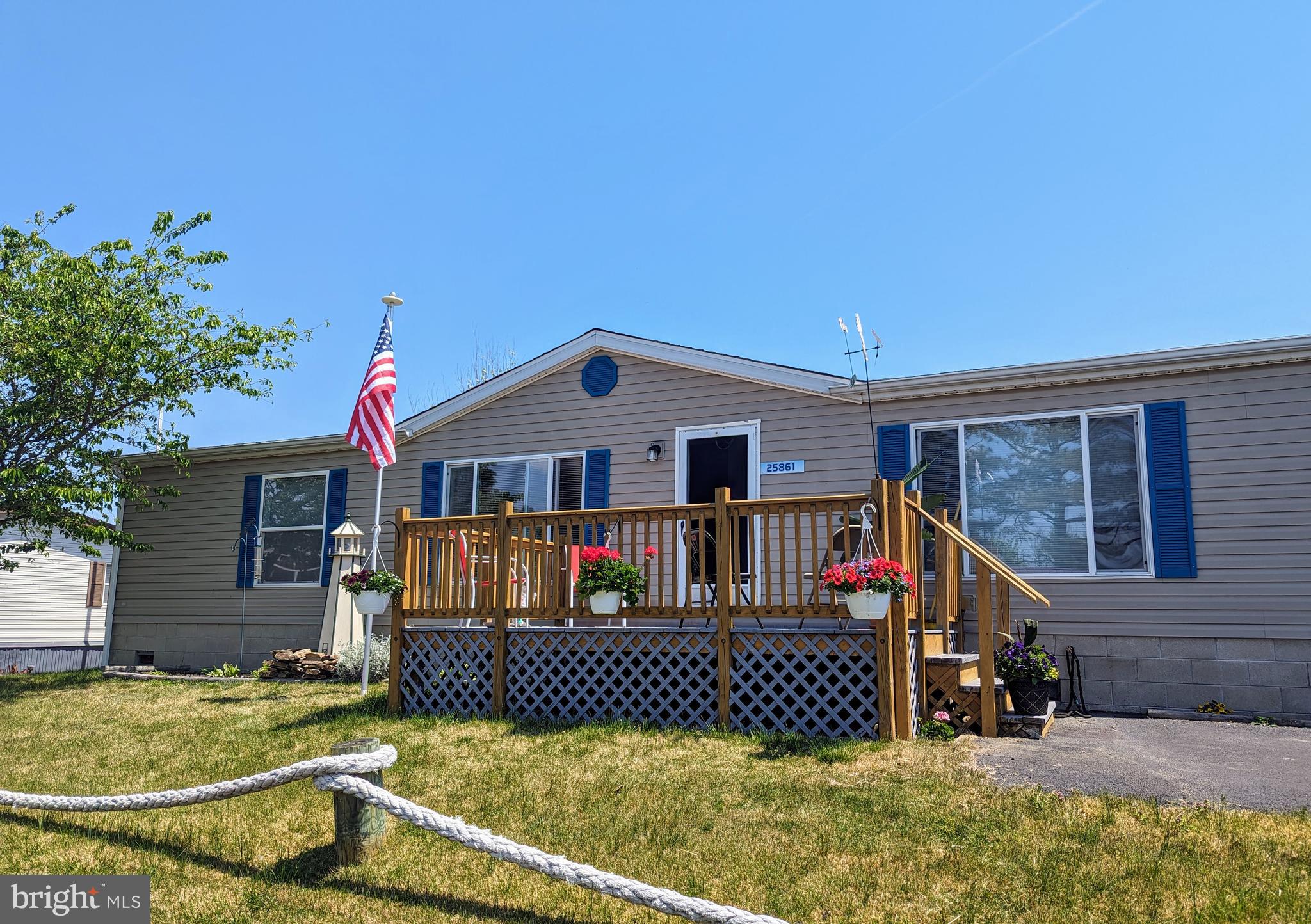 a view of house with roof deck