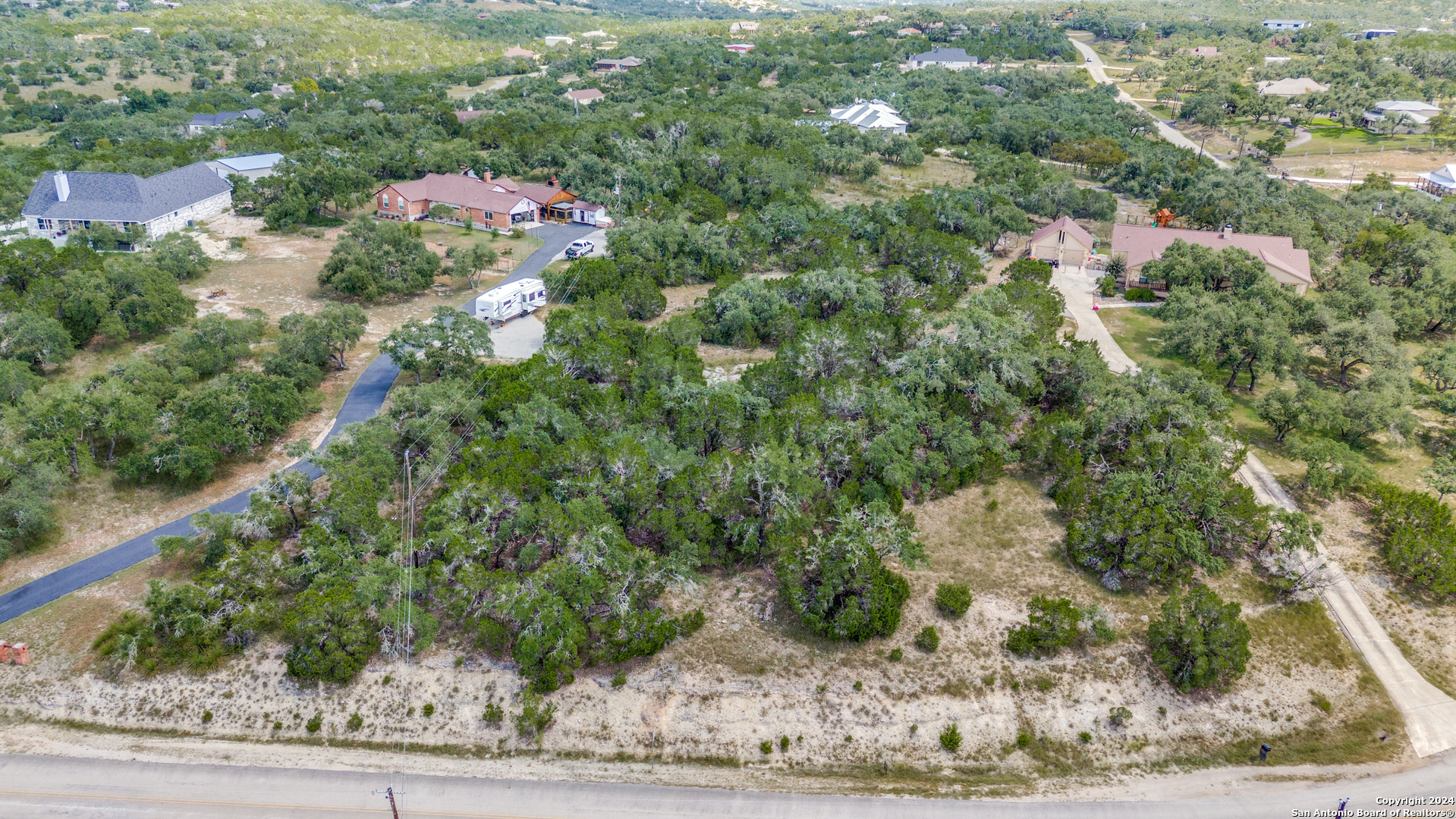 an aerial view of residential house with outdoor space