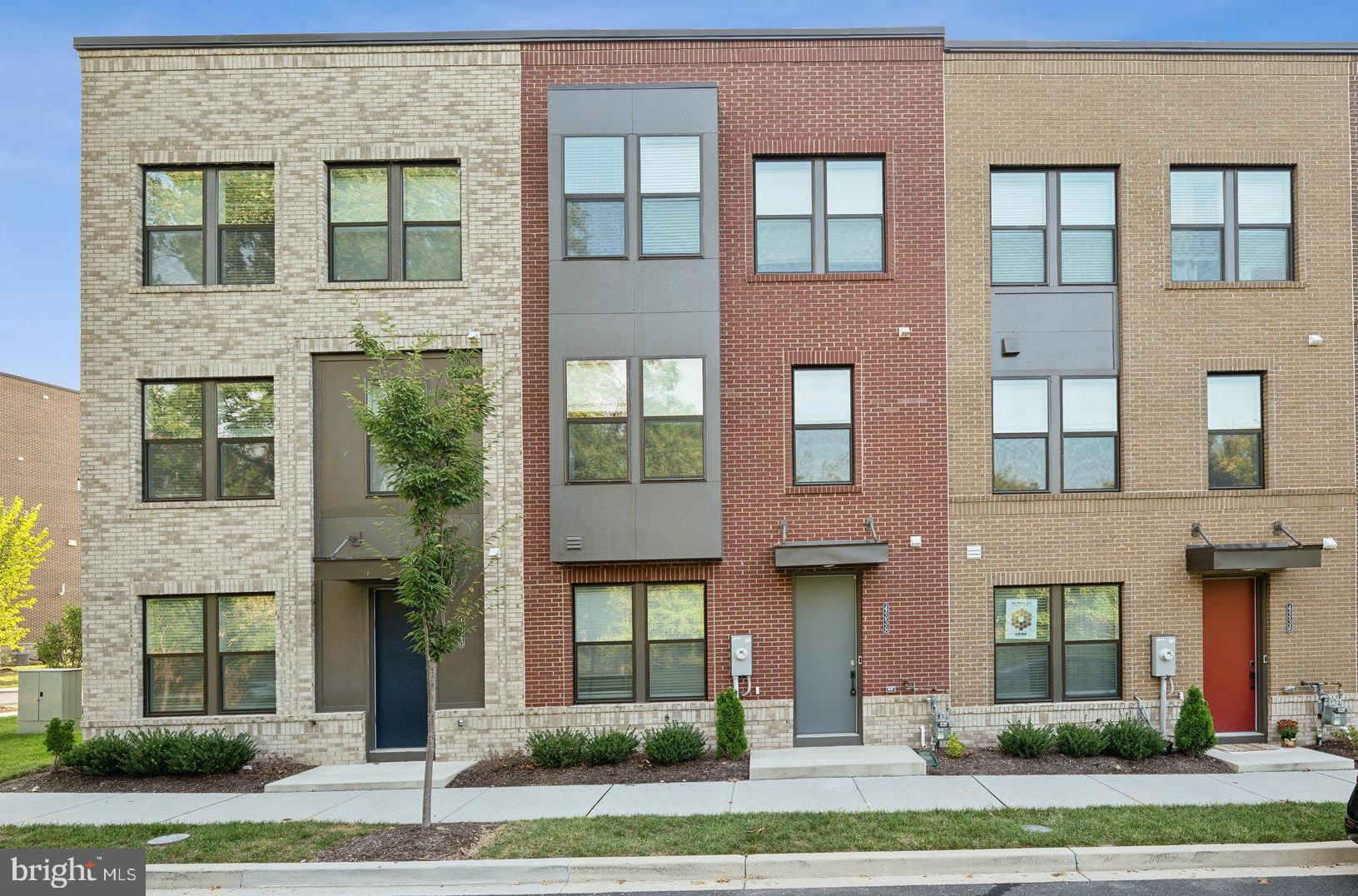 a front view of a multi story residential apartment building