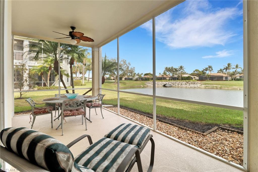 a view of a patio with chairs and table in patio