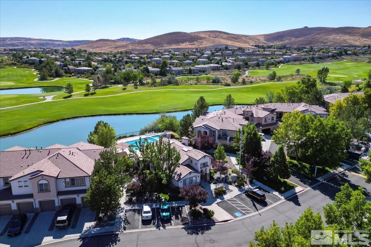 an aerial view of a house with a garden