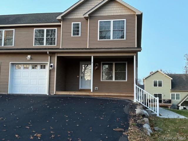 View of front of house featuring a garage