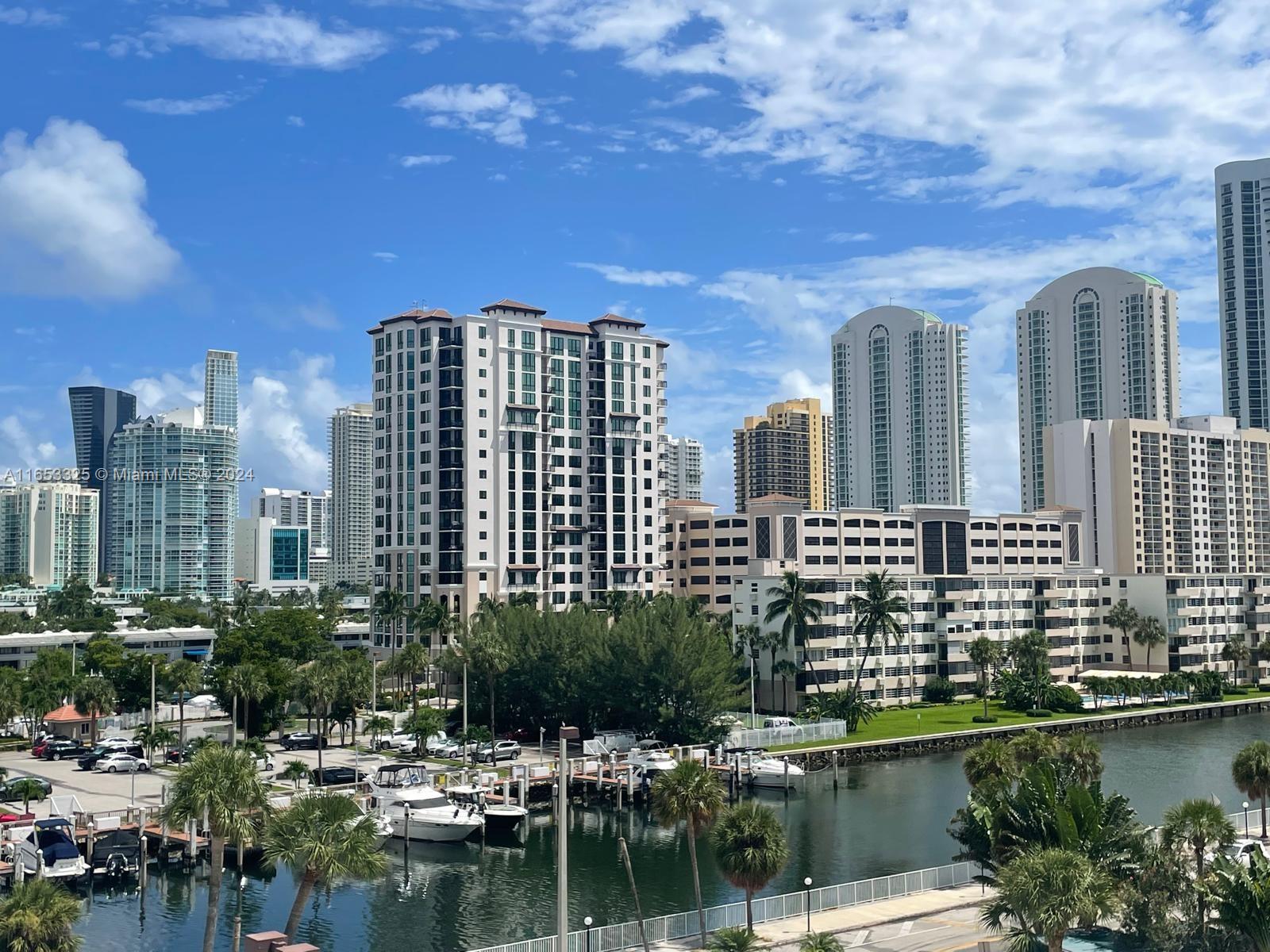 a view of a city with tall buildings