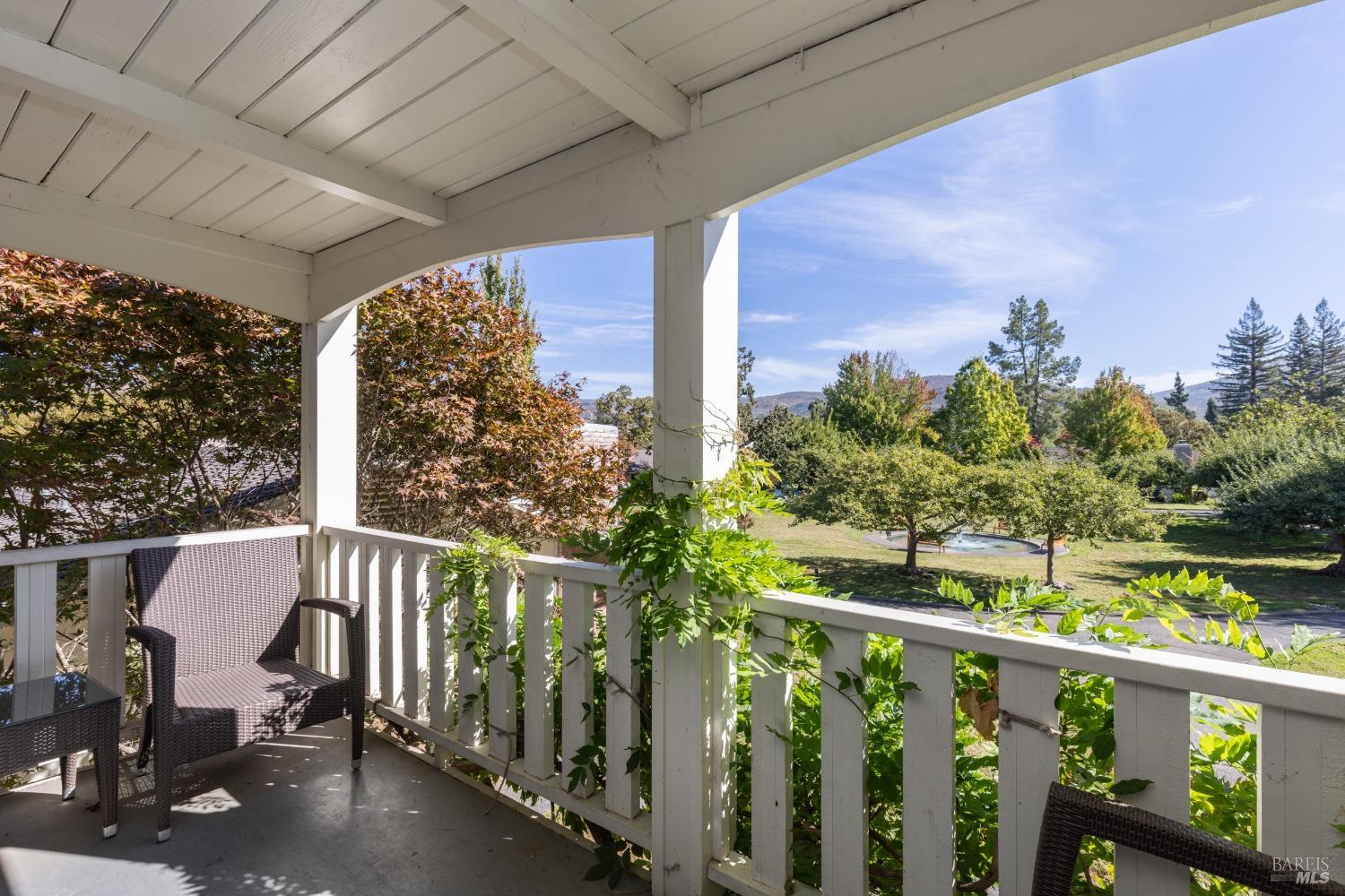 a view of a porch with a yard