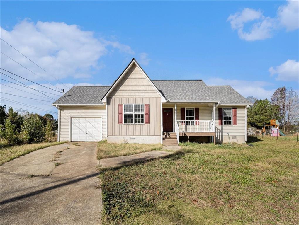 a view of a house with a yard