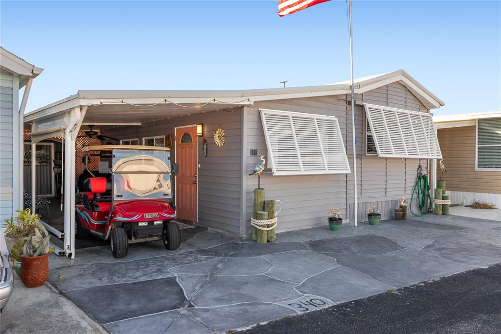 a view of a car park in front of house